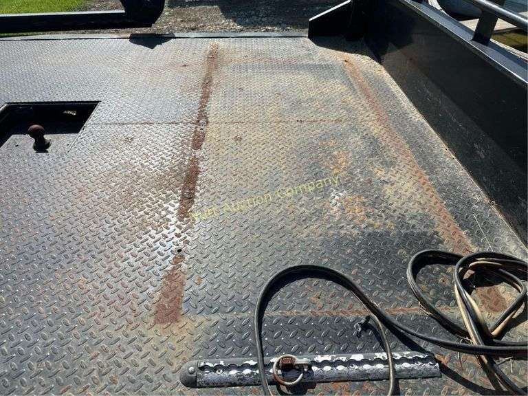 CM Truck Beds RD Model Flatbed, equipped with hydraulic bale lift. Steel, 9'4" x 94"
