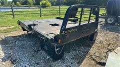 CM Truck Beds RD Model Flatbed, equipped with hydraulic bale lift. Steel, 9'4" x 94"