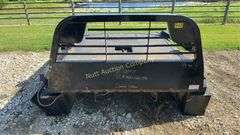 CM Truck Beds RD Model Flatbed, equipped with hydraulic bale lift. Steel, 9'4" x 94"