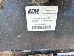 CM Truck Beds RD Model Flatbed, equipped with hydraulic bale lift. Steel, 9'4" x 94"
