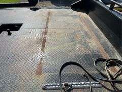 CM Truck Beds RD Model Flatbed, equipped with hydraulic bale lift. Steel, 9'4" x 94"