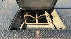 CM Truck Beds RD Model Flatbed, equipped with hydraulic bale lift. Steel, 9'4" x 94"