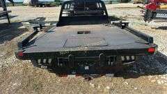 CM Truck Beds RD Model Flatbed, equipped with hydraulic bale lift. Steel, 9'4" x 94"