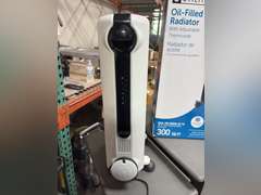 (2) Utilitech Oil Filled Radiator Heaters w/ Thermostat - Heats up to 300sq ft.