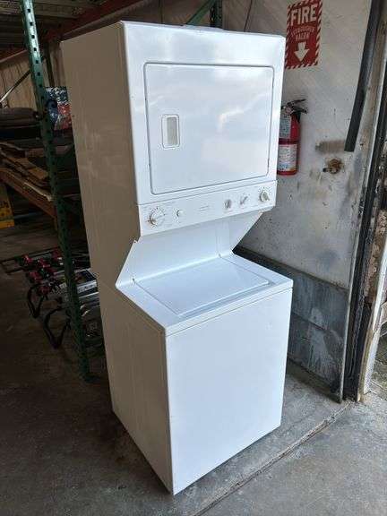 GE Stacked Laundry Center with 3.8-cu ft Top load Washer and Electric 5.9-cu ft Dryer