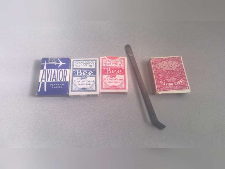 tweezers and playing cards