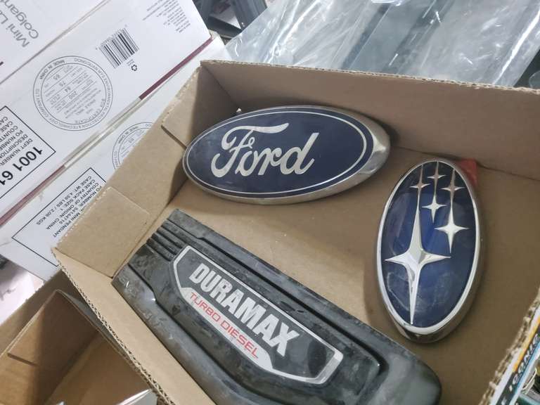 CAR EMBLEMS, NEW CAR PARTS, GREAT FOR RESELLERS!!! - #1 Online Auctions LLC