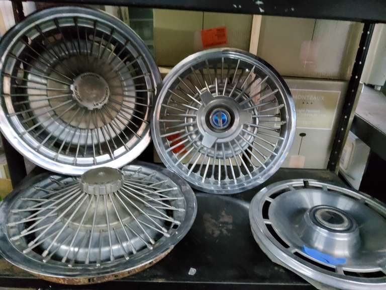 4 VINTAGE HUBCAPS