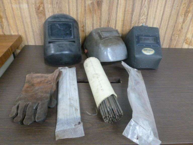 Group Of Welding Rods / Welding Helmets