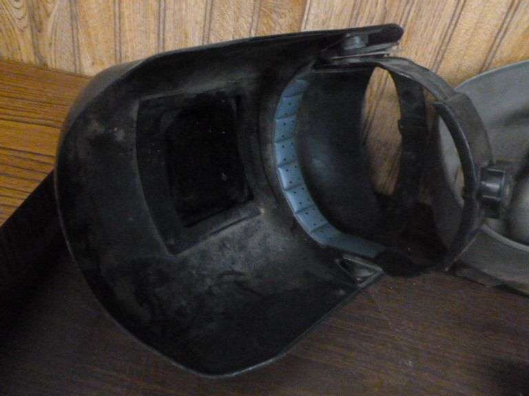 Group Of Welding Rods / Welding Helmets