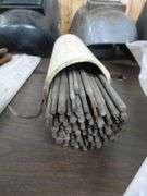 Group Of Welding Rods / Welding Helmets