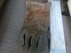 Group Of Welding Rods / Welding Helmets