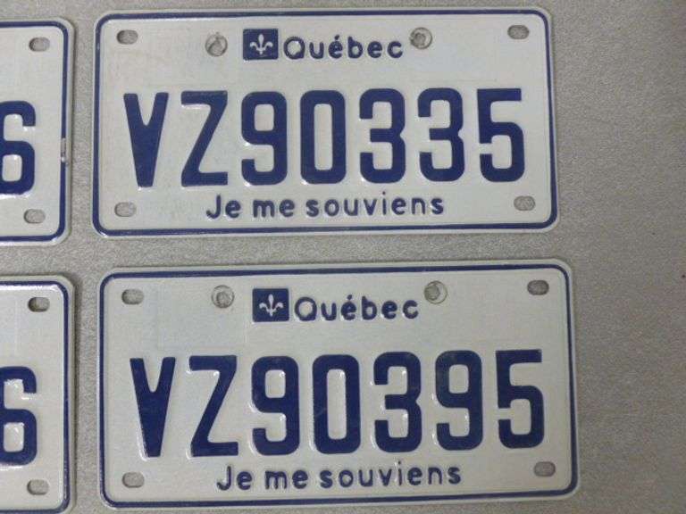 (4) Quebec License Plates