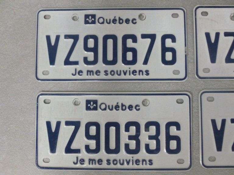 (4) Quebec License Plates