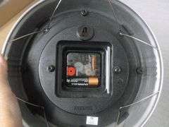 Infinity Battery Operated Wall Clock - 9.5" Diameter