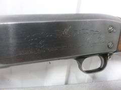 Ithaca Model 37 - Featherlite 12GA. Pump Action Shotgun With Case