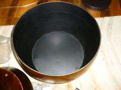 Fashioned Metal End Table with Storage