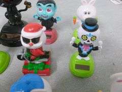Group Of (14) Collectible Solar Figurines