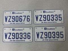 (4) Quebec License Plates