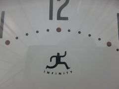 Infinity Battery Operated Wall Clock - 9.5" Diameter