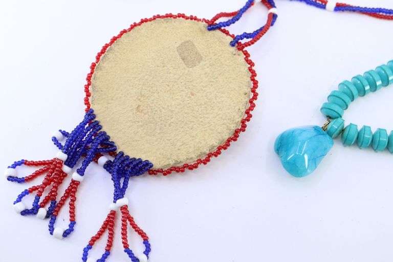 3 NECKLACES, TURQUOISE 20", SHELL 34", RED WHITE AND BLUE BEADED 26" DESIGNS,
