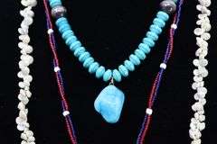 3 NECKLACES, TURQUOISE 20", SHELL 34", RED WHITE AND BLUE BEADED 26" DESIGNS,