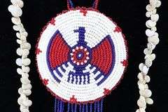 3 NECKLACES, TURQUOISE 20", SHELL 34", RED WHITE AND BLUE BEADED 26" DESIGNS,