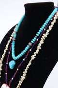 3 NECKLACES, TURQUOISE 20", SHELL 34", RED WHITE AND BLUE BEADED 26" DESIGNS,