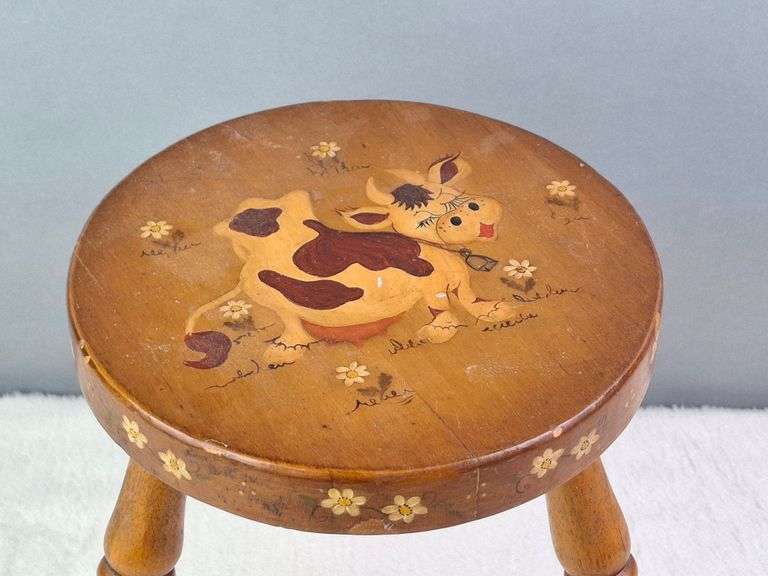 WOODEN MILKING STOOL, HAND PAINTED DAIRY COW WITH WHITE DAISIES, 11.5"H.