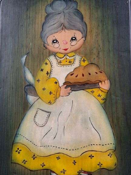 HAND PAINTED VINTAGE WOODEN BREAD BOARD, GRANDMA WITH HOMEMADE PIE, SIGNED FRAN '74, 13" X 6.75".