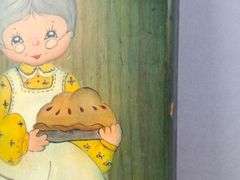 HAND PAINTED VINTAGE WOODEN BREAD BOARD, GRANDMA WITH HOMEMADE PIE, SIGNED FRAN '74, 13" X 6.75".