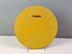 ROUND WOODEN PLAQUE WITH A HAND-PAINTED BASKET FILLED WITH DAISIES, SIGNED FRAN '75, 9.5"W.