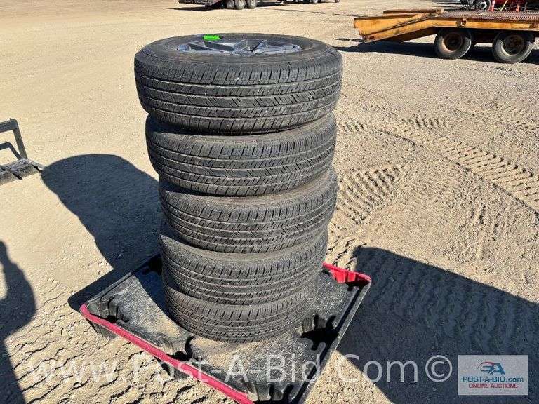 4-Bridgestone 245/75/R17 Tires On Black Rims With Steel Matching Spare Whee