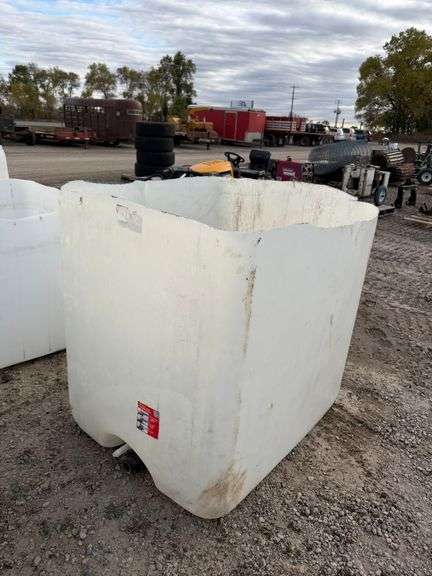 Tote with top cut off, great for storing wood.