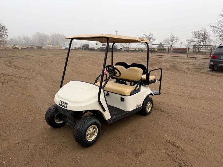 2016 EZ-GO 4 Seater Gas Golf Cart With Canopy, Back Seat Folds Down, Reverse. Runs And Drives.