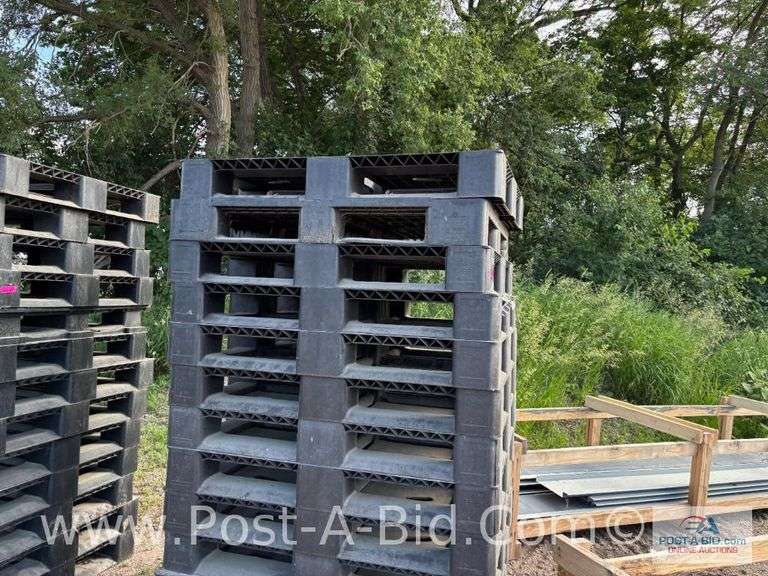 13-Black Plastic Pallets.