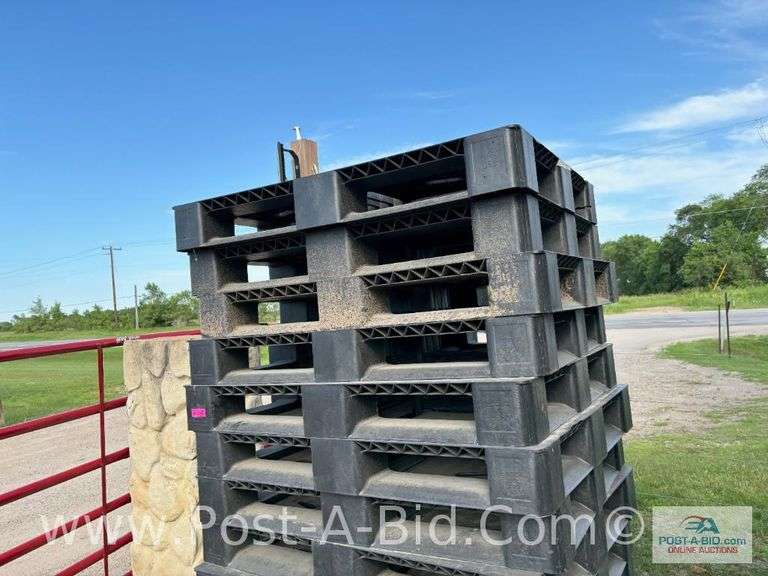 13-Black Plastic Pallets.