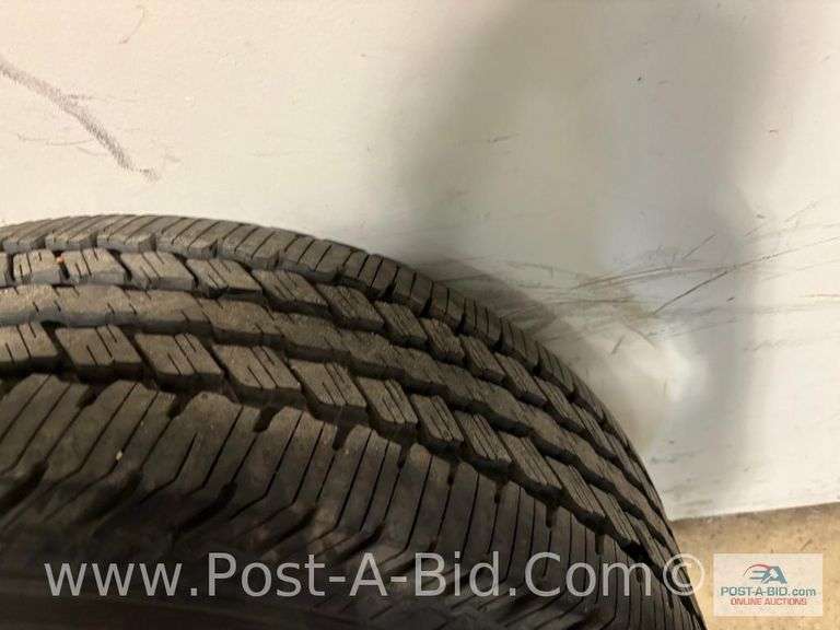 Continental Used Tire LT 275/65 R18 On 8 Bolt Rim.
