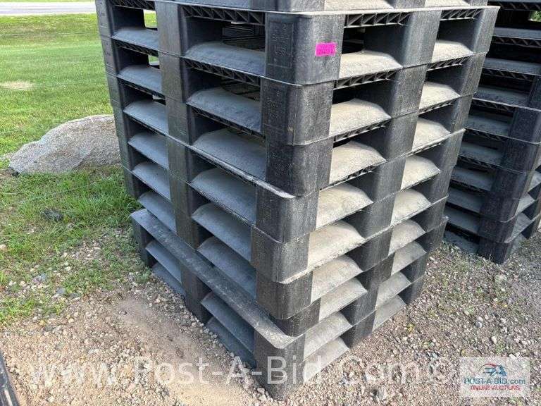 13-Black Plastic Pallets.