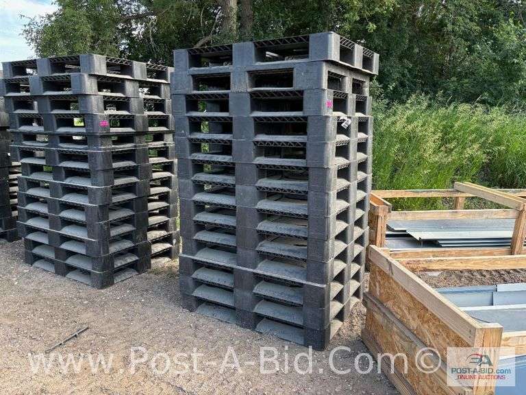13-Black Plastic Pallets.