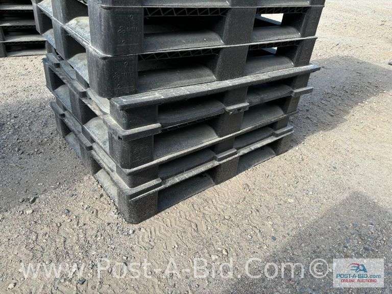 13-Black Plastic Pallets.