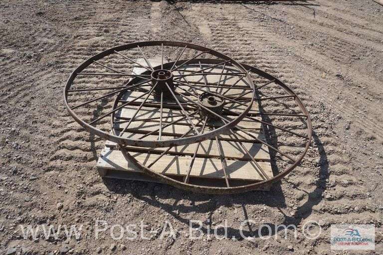 2-Dump Rake Wheels, Approx. 53" Diameter.