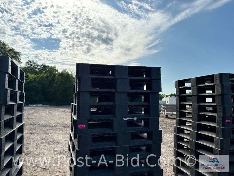 13-Black Plastic Pallets.