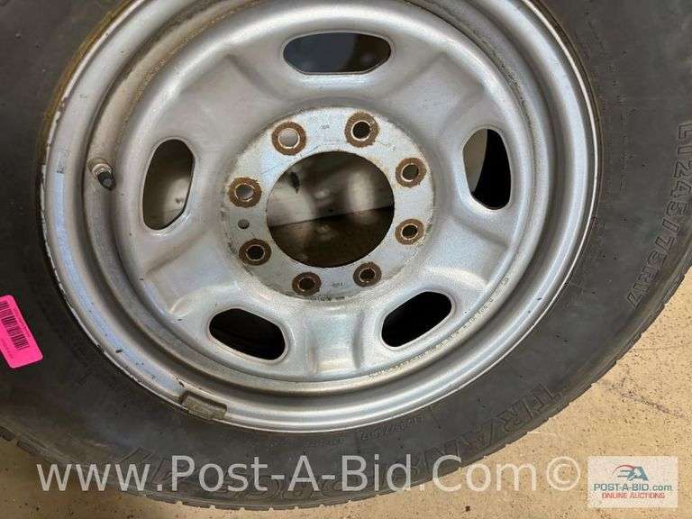 Firestone Used Tire LT 245/75/R17 On 8 Bolt Rim.