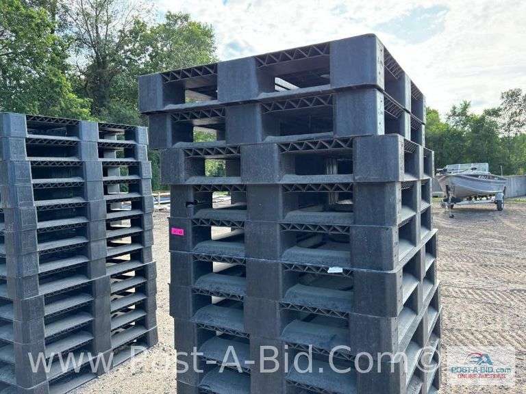 13-Black Plastic Pallets.