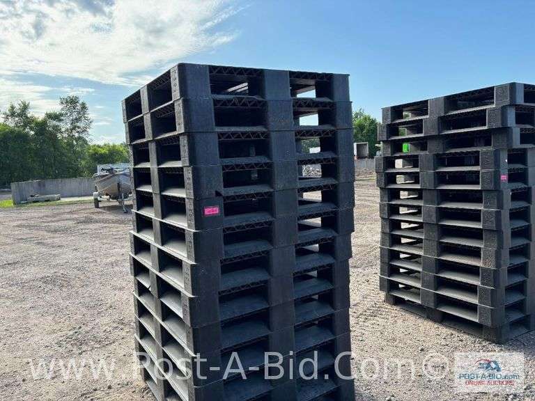 13-Black Plastic Pallets.