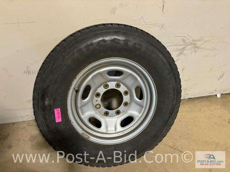 Firestone Used Tire LT 245/75/R17 On 8 Bolt Rim.