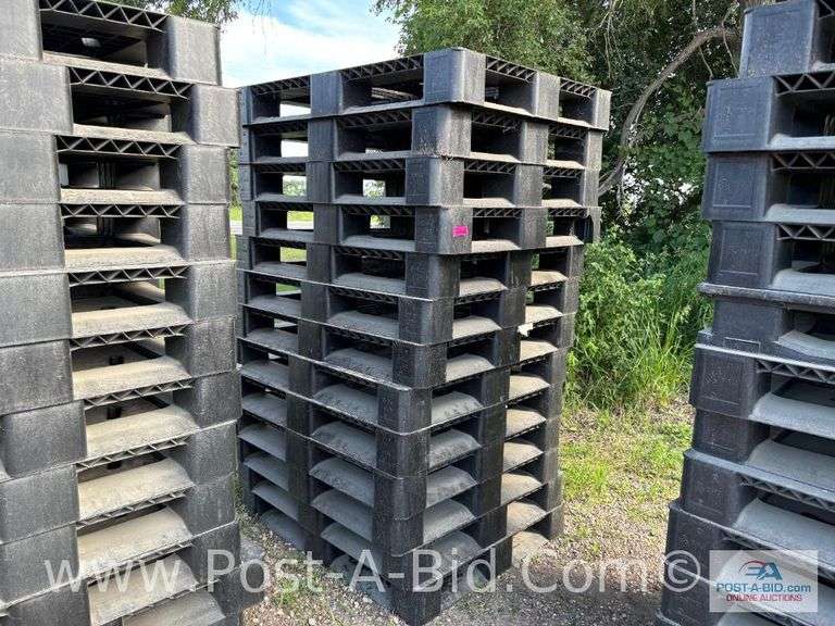 13-Black Plastic Pallets.