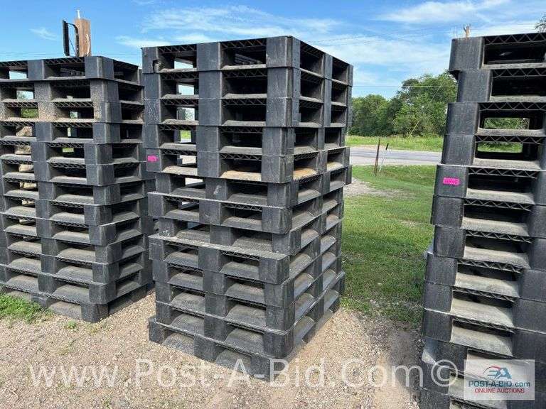 13-Black Plastic Pallets.