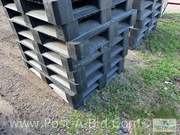 13-Black Plastic Pallets.